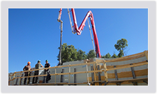 When pouring concrete for tall walls, a pump truck is used to deliver the concrete into the Advantage ICFs